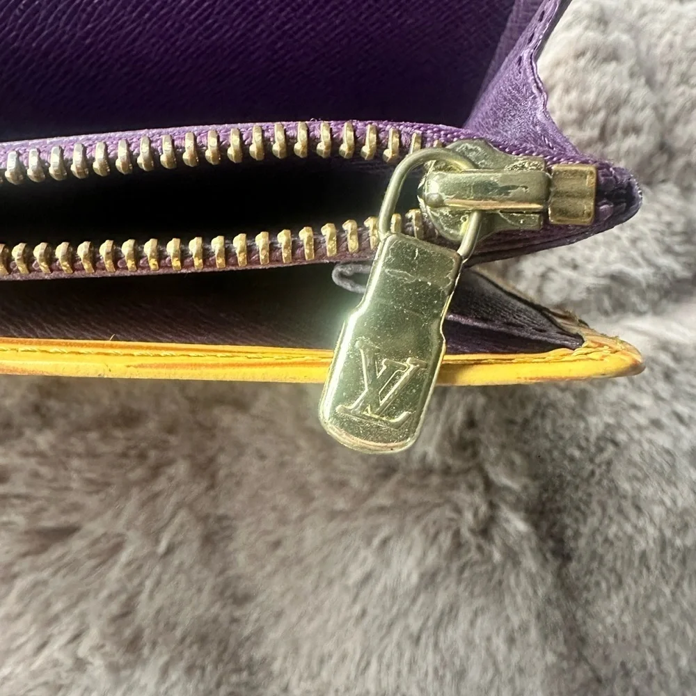 Louis Vuitton Yellow Epi Long Wallet with Purple Interior.